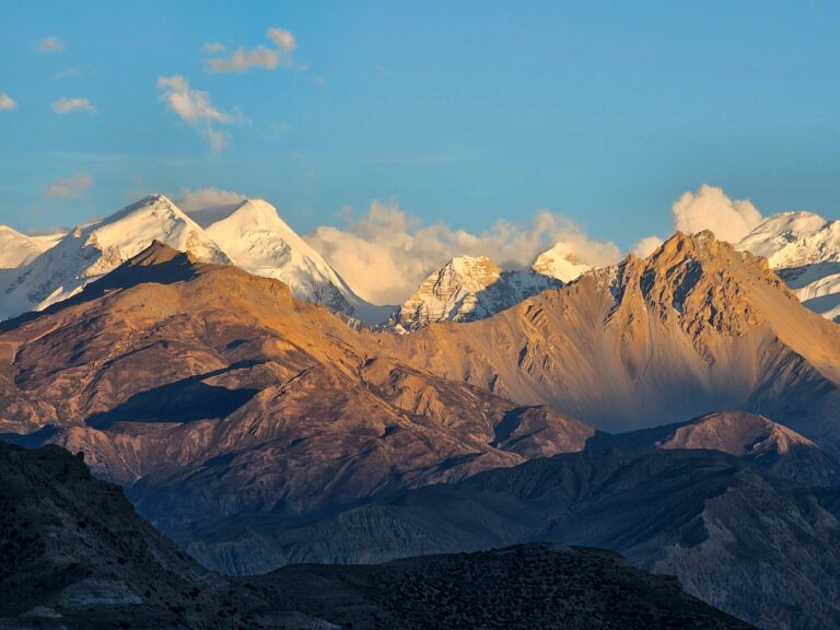 Trekkers exploring the arid landscapes and villages of Mustang, during Lower Mustang Trek